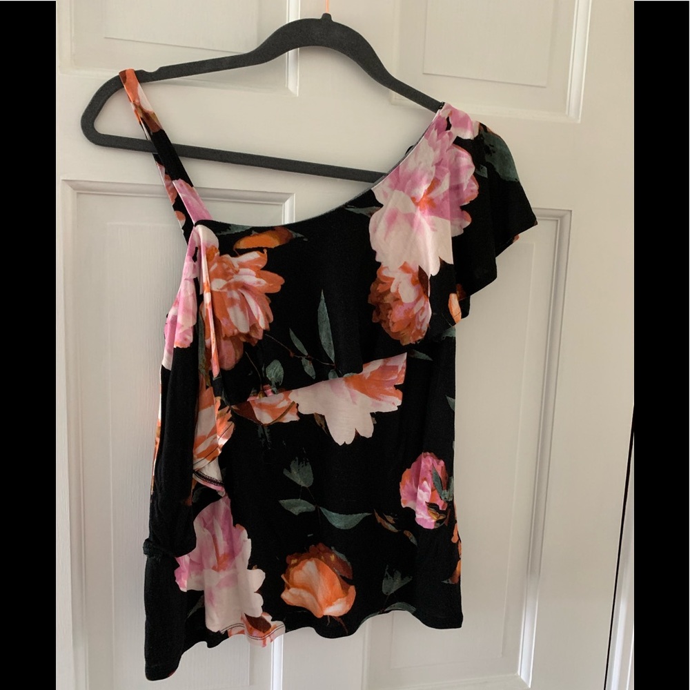 Jennifer Lopez black and floral tank.